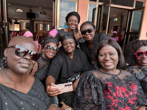Group selfie at a gathering