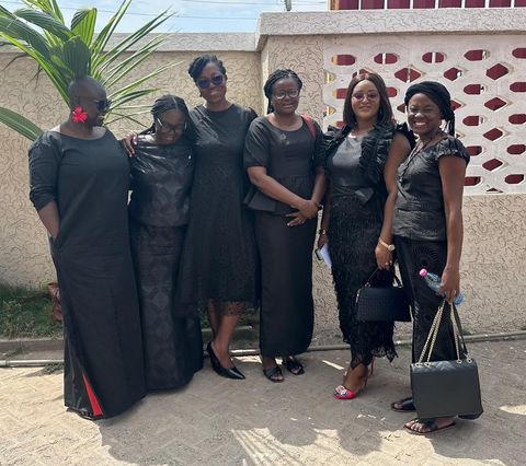 Friends in black at a gathering